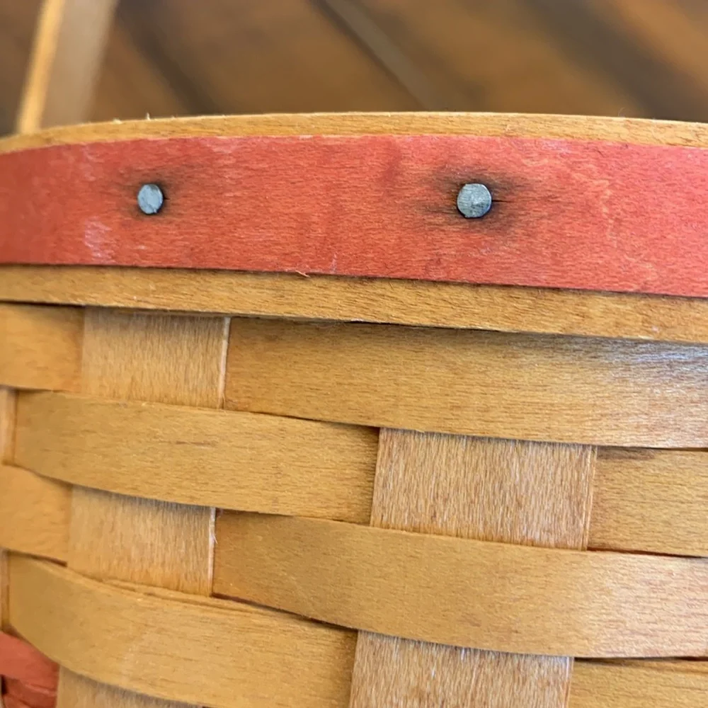 Longaberger Basket with Red Accent Weave. Single stationary handle.